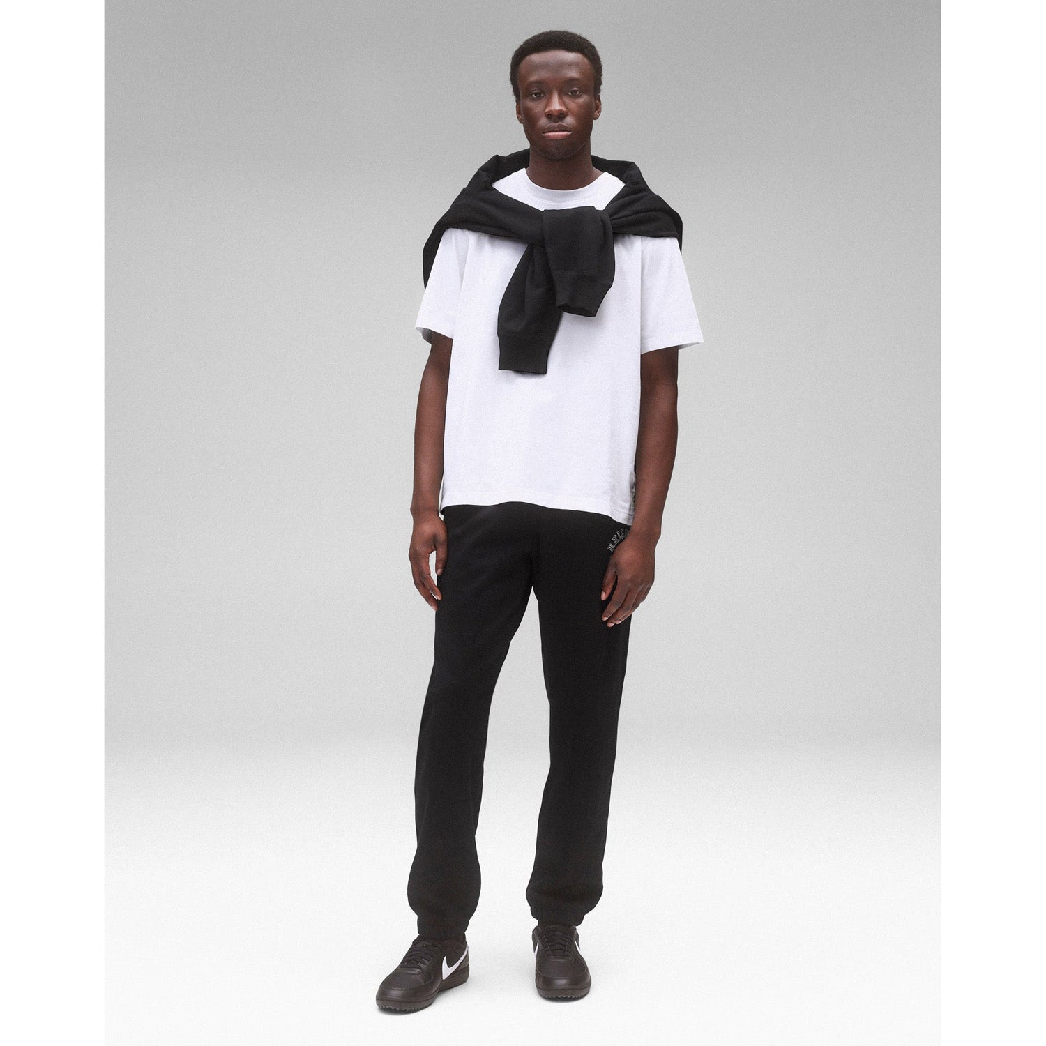 Reigning Champ Men Knit Midweight Terry Arch Logo Sweatpant Black White - BOTTOMS - Canada