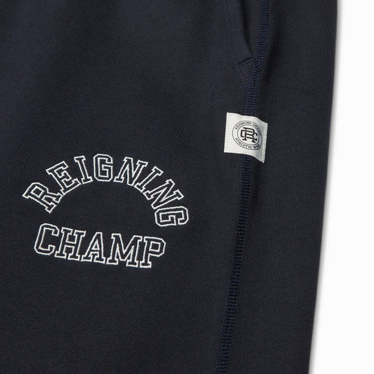 Reigning Champ Men Knit Midweight Terry Arch Logo Sweatpant Navy White - BOTTOMS - Canada