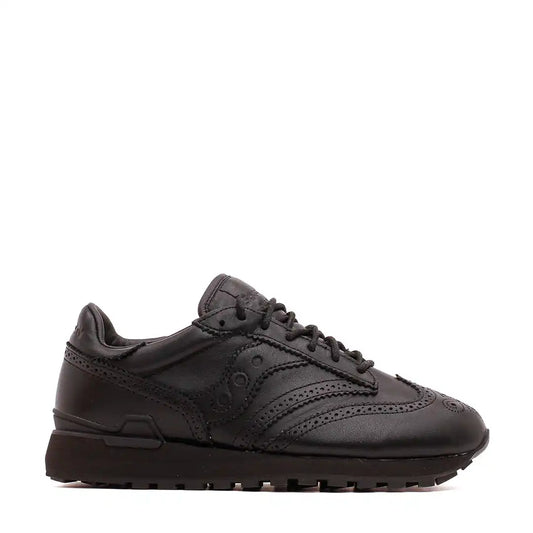 Black leather men’s dress sneaker with brogue detailing.