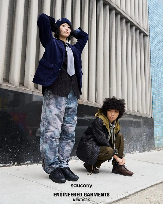 Blue and gray camouflage pants with a tie detail.