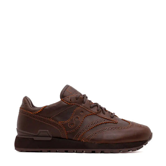 Brown leather sneaker with brogue detailing and rubber sole