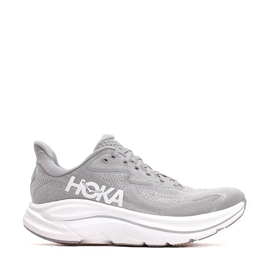 Light grey athletic shoe with a thick white sole.