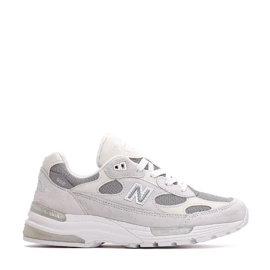A light grey and white New Balance 992 running shoe.