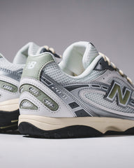 New Balance Unisex 204L Silver Metallic Garter Snake U204LSWB - FOOTWEAR - Canada