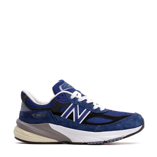 A single blue and black New Balance 990v4 sneaker with white laces.