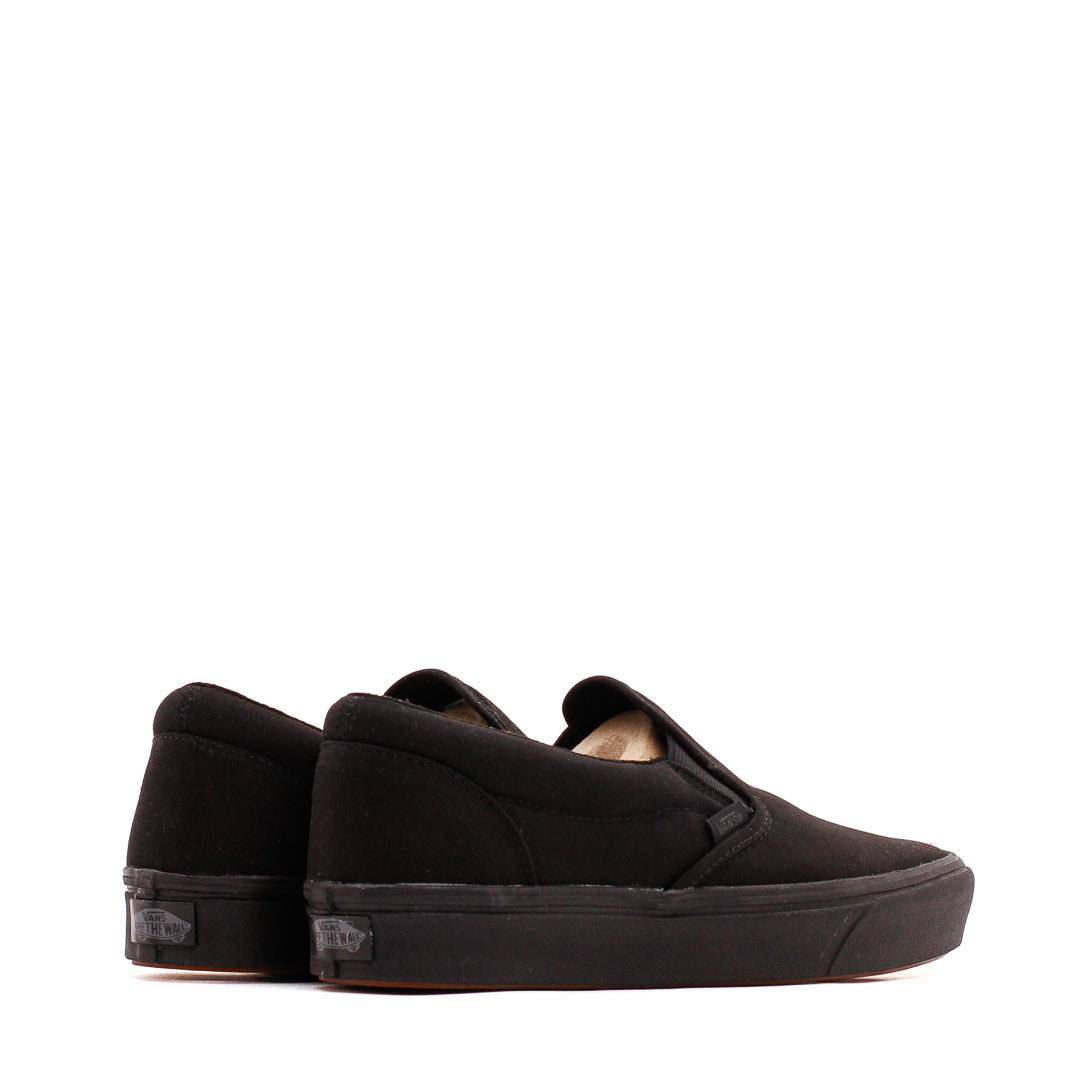 Triple black slip on vans sale